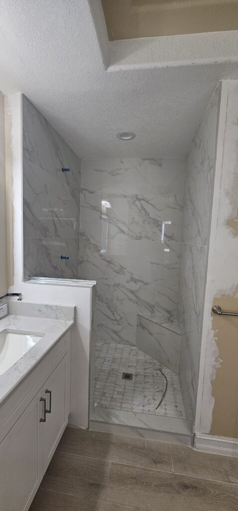 Tailored Floor-to-Ceiling Stone Shower